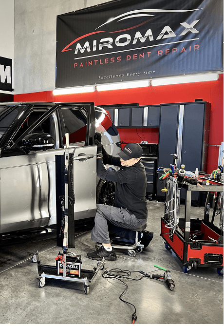 Technician working on door