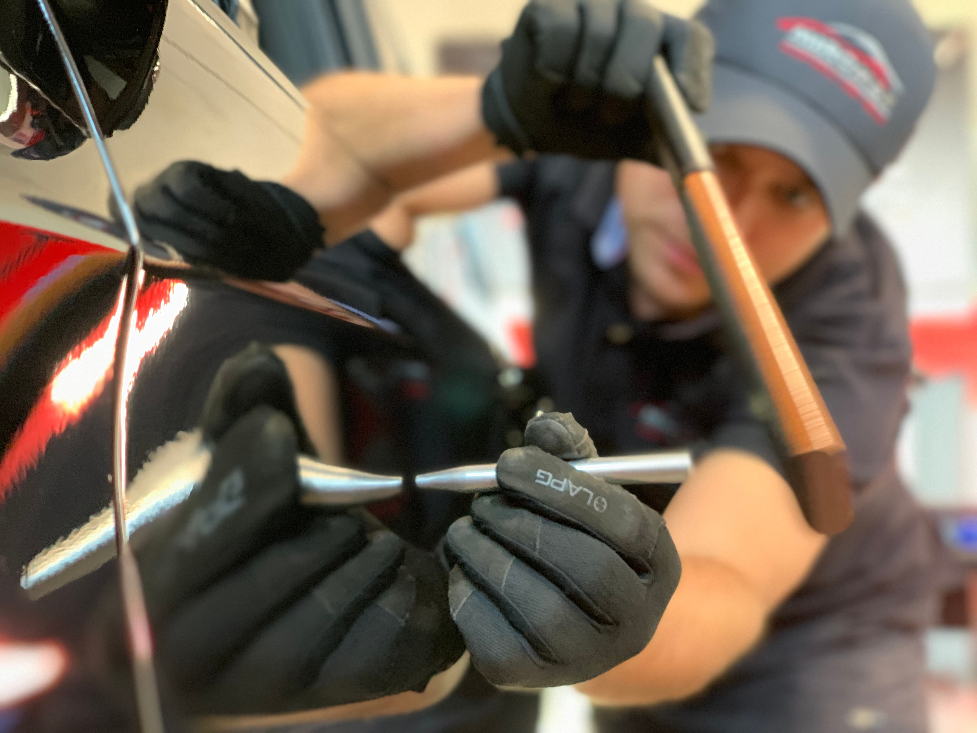 Miro tapping dent close up