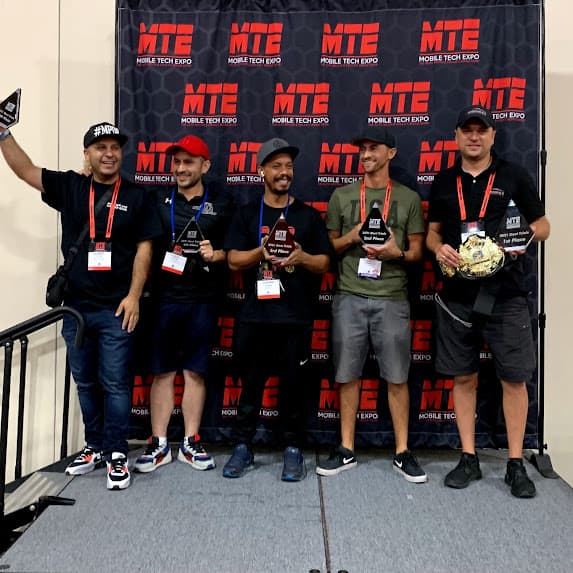 Celebrating the 2021 victory with the team