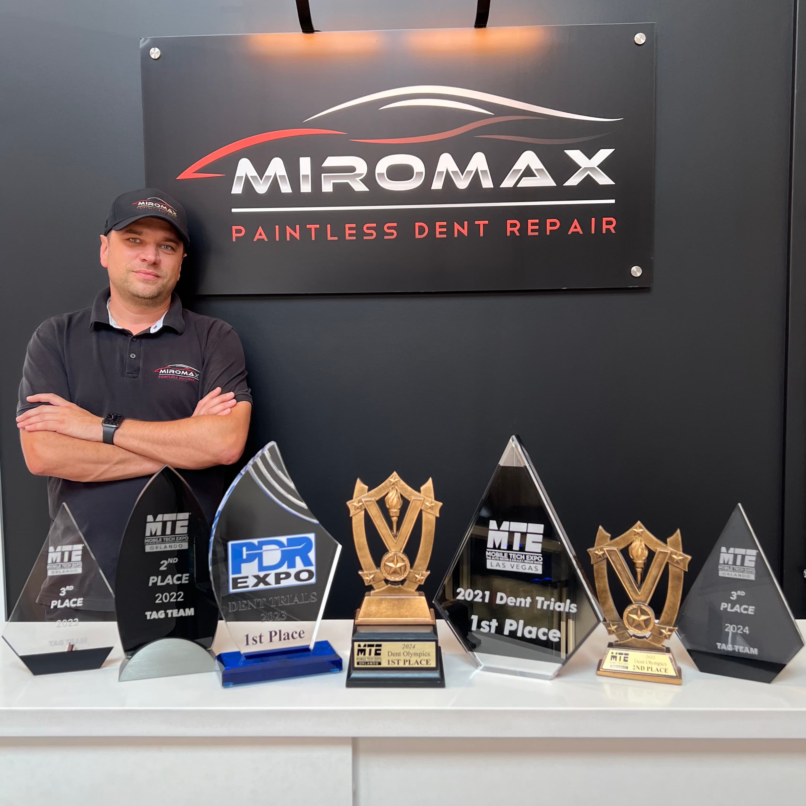Miroslav Hubenko with his collection of PDR competition trophies