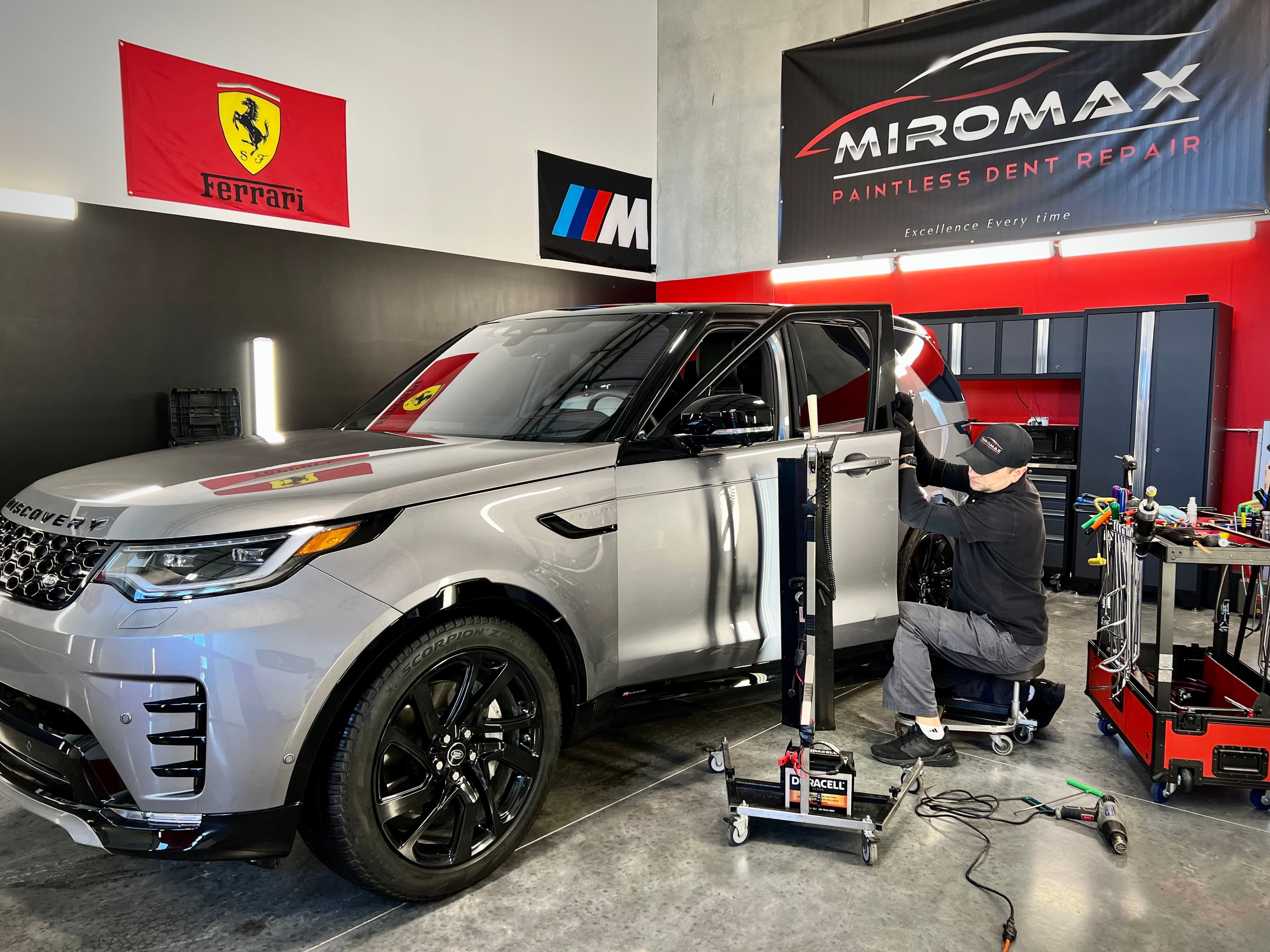 Technician working on door