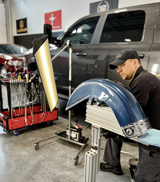 Professional technician performing detailed repair work